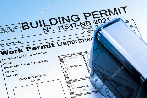 Building permit documents and plans on a table in Mauritius