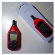 Humidity meter being used during an apartment inspection