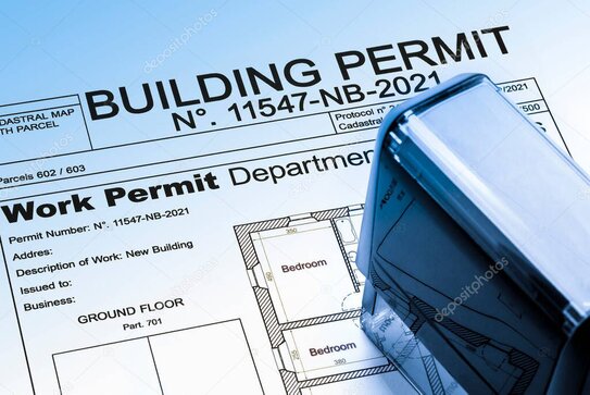 Building permit documents and plans on a table in Mauritius